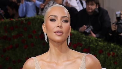 Kim Kardashian wore a dress owned by Marilyn Monroe for the 2022 Met Gala. Reuters