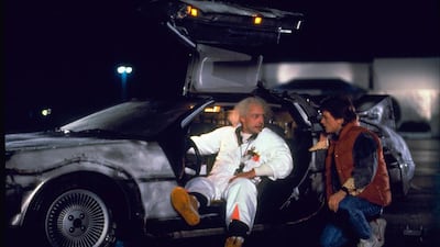 Christopher Lloyd, left, as Dr Emmett (Doc) Brown, and Michael J Fox as Marty McFly, in the 1985 film Back to the Future. Universal Pictures Home Entertainment / AP Photo
