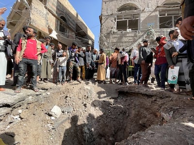 A crater at the site of a strike in Sanaa on Monday. Reuters
