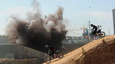 Motorcyclists take part in the Idex opening ceremony. Reuters