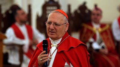 Cardinal Louis Raphael Sako addresses the faithful during the Palm Sunday service at Mar Youssif Church in Baghdad, Iraq, Sunday, April 14, 2019. AP