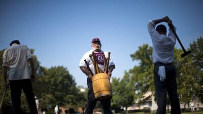 "We try to do everything we can as close as possible to the period," Alberts said. "Because if we're not doing that, we might as well just be playing softball in the park," says Alberts (unseen). Matt Rourke / AP