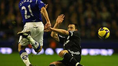 John Terry sends Leon Osman flying with a high tackle that earned the Chelsea captain a red card.