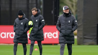 Liverpool manager Jurgen Klopp, right, leads training on Tuesday, February 15, 2022, ahead of Wednesday's Champions League last-16 clash with Inter Milan. PA