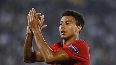 Jesse Lingard acknowledges Manchester United fans at the Partizan Stadium. Getty Images