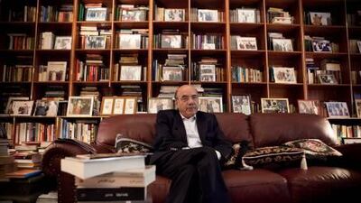 Zaki Nusseibeh, the vice chairman for the Abu Dhabi Authority for Cultural Affairs, relaxes in his home library.