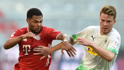 Bayern Munich's Serge Gnabry in action with Monchengladbach's Nico Elvedi. Reuters