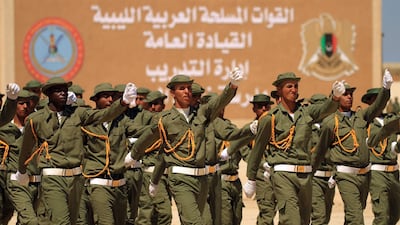 Fighters from the self-proclaimed Libyan National Army loyal to Khalifa Haftar attend their graduation ceremony at a military academy in Libya's eastern city of Benghazi. AFP
