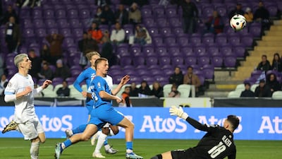 Albert Gudmundsson lifts the ball over the goalkeeper to score Iceland's third goal. Reuters