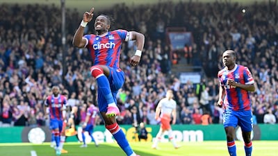 Crystal Palace's Wilfried Zaha celebrates after scoring their second goal in the 4-3 Premier League win against West Ham United at Selhurst Park on April 29, 2023. AFP