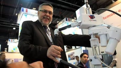 Dr Eric Lefebvre of AdEchoTech demonstrates the tele-echography system at the Arab Health exhibition in Dubai. Satish Kumar / The National