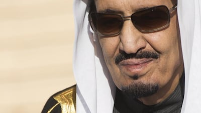 Saudi Arabia's King Salman stands during the arrival of US president Barack Obama and First Lady Michelle Obama at King Khalid International Airport in Riyadh. Saul Loeb / AFP