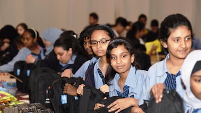 More than 3,500 volunteers turned out to help pack 50,000 school kits in support Dubai Cares community campaign for Gaza. Courtesy Dubai Cares