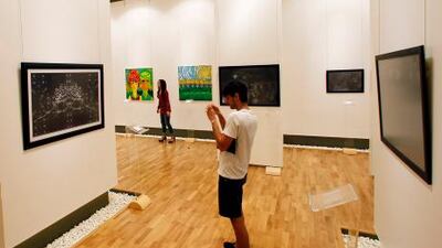 Art makes you happy, according to a Norwegian study. Just so long as it’s not too crowded.