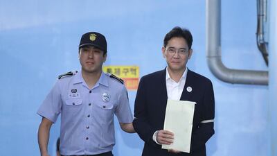 Samsung Group heir Lee Jae-yong leaves the Seoul Central District Court following his conviction and sentencing on August 25, 2017. Chung Sung-Jun / AFP