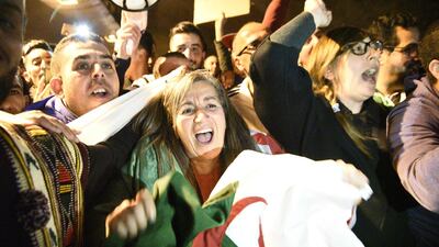 Algerians celebrate in Algiers. AFP
