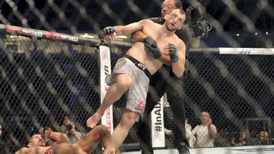 Welterweight bout between Nordine Taleb and Muslim Salikhov (grey shorts, winner) in the Early Prelims at UFC 242. Chris Whiteoak / The National