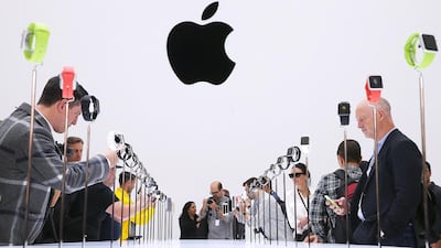 Attendees look at a display of the new Apple Watch during an Apple special event at the Flint Center for the Performing Arts on September 9, 2014 in Cupertino, California. Apple unveiled the Apple Watch wearable tech and two new iPhones, the iPhone 6 and iPhone 6 Plus. Justin Sullivan / Getty Images / AFP