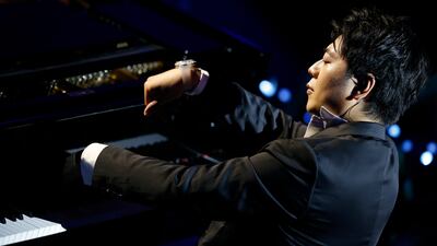 Chinese pianist Lang Lang performs during the opening ceremony of Expo 2020 Dubai at Al Wasl Plaza. EPA