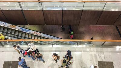 Shoppers in Dubai Mall. VAT deadlines must be adhered to otherwise fees and interest are fair game. Antonie Robertson / The National