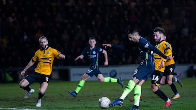Manchester City's Riyad Mahrez makes it 4-1. EPA