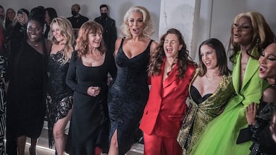 Celebrities who attended Christian Siriano's New York Fashion Week presentation, from left to right: Danielle Brooks, Alicia Silverstone, Susan Sarandon, Hannah Waddingham, Drew Barrymore, Anna Chlumsky, Symone and MJ Rodriguez. AP