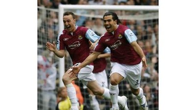Carlos Tevez, right, finished the 2006/07 season with a flourish to help West Ham United avoid relegation. Eddie Keogh / Reuters