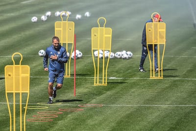 Bayern Munich's head coach Hansi Flick leads his team's training session on May 6. EPA