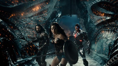 Jason Momoa as Aquaman, Gal Gadot as Wonder Woman, and Ray Fisher as Cyborg, in a scene from 'Zack Snyder's Justice League'. HBO Max via AP
