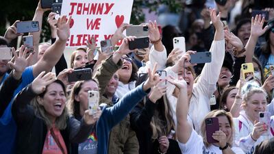 Fans cheer as US actor Johnny Depp arrives at the Fairfax County Circuit Courthouse in Fairfax, Virginia. AFP