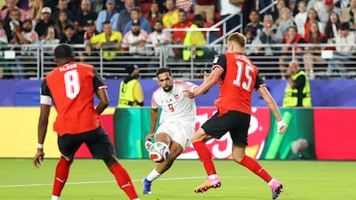 Ali Olwan curls home Jordan's equaliser. AFP
