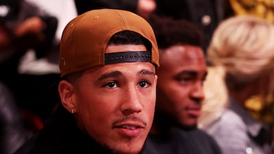 NBA player Devin Booker of the Phoenix Suns attends the fight between Jake Paul and Anderson Silva. AFP