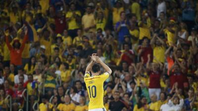 James Rodriguez acknowledges fans after Colombia's win over Uruguay on Saturday to go to the 2014 World Cup quarter-finals. Sergio Moraes / Reuters
