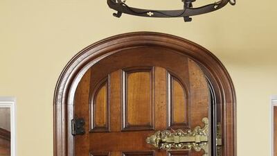 Three storerooms, one of which was originally used to store silverware, the others as cellars, can be accessed through a door below the main staircase. Courtesy Cheffins