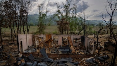 The shell of a burnt house after ethnic clashes and rioting in Sugnu, in the north-eastern Indian state of Manipur. AP