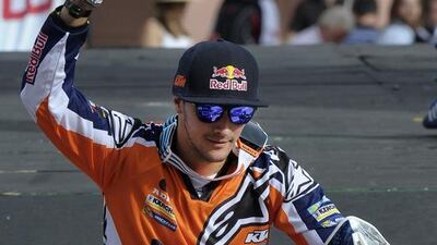 British biker Sam Sunderland waves from his KTM on the podium during the symbolic start of the 2015 Dakar Rally in Buenos Aires on Sunday. Alejandro Pagni / AFP