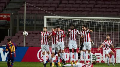 Barcelona's Lionel Messi scores from a free-kick to make it 1-0. EPA