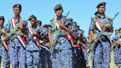 Newly-formed troops loyal to Yemen's Saudi-backed government take part in a parade in the eastern province of Marib. EPA