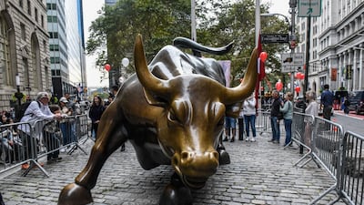 The Charging Bull statue in New York's financial district. October has lived up to its reputation for volatility, as a surge in Treasury yields and geopolitical uncertainty pressured stocks. Bloomberg