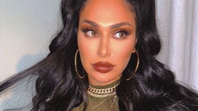 Huda Kattan this week told fans she needed a break to 'recentre' herself. Instagram / Huda Kattan