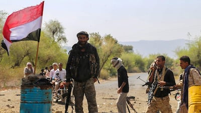 Resistance fighters loyal to Yemeni president Abdrabu Mansur Hadi hold a position on the outskirts of Taez city on January 26, 2016. Ahmad Al Basha/AFP