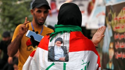Supporters of Iraqi Shiite cleric Moqtada Al Sadr outside the Iraqi parliament building in Baghdad on August 16. AFP