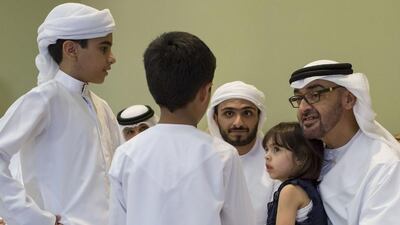 Sheikh Mohammed bin Zayed, Crown Prince of Abu Dhabi and Deputy Supreme Commander of the UAE Armed Forces, speaks with young guests whilst offering condolences to the family of Ahmed Ghulam Abdulkareem Lengawi. Ryan Carter / Crown Prince Court - Abu Dhabi