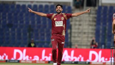 Junaid Siddique of Northern Warriors celebrates after taking the wicket of Colin Ingram during the Abu Dhabi T10. Pawan Singh / The National