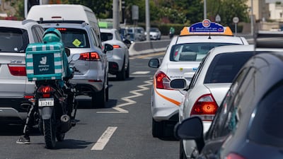 The rules for delivery riders on Dubai and Sharjah roads have changed. Antonie Robertson/The National