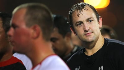 Alistair Thompson, right, looks a natural wearing the black Saracens top after a training session. Delores Johnson / The National
