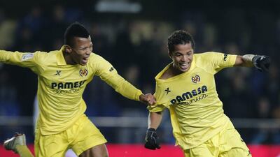 Ikechukwu Uche, left, and Gio Dos Santos, right, both scored twice for Villarreal on Monday. Jose Jordan / AFP
