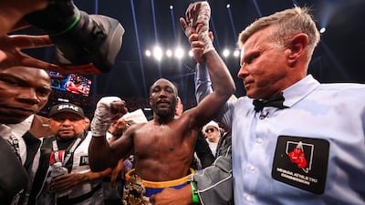 Terence Crawford has his hand raised after defeating Canelo Alvarez for the undisputed super middleweight championship at Allegiant Stadium, Las Vegas. Getty Images