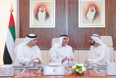 Deputy Prime Ministers Sheikh Mansour bin Zayed and Sheikh Saif bin Zayed speak with Sheikh Mohammed at the Cabinet meeting. Courtesy: Dubai Media Office