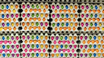 Freshly-painted Easter eggs are stacked in cartons at Baumeister Frischei egg and chicken farm in Breckerfeld, Germany. Sascha Schuermann/ Getty Images